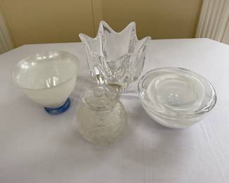 Art glass items - a frosted textured blue and clear glass bowl signed by artist, a clear glass flower form bowl/vase signed by artist, a Czechoslovakian hand-made crystal footed bowl, and a large round clear glass bowl