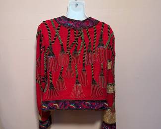 Another view of 1980's red silk beaded jacket by Della Roufogali for Niteline, size M