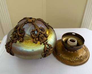 Another view of the lovely antique Art Nouveau era iridescent blown cased glass ceiling mount light fixture with bronze floral scrolls and repoussé base