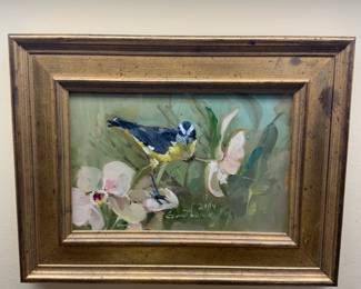 Framed painting of a bird perched on flowers, signed and dated 2014