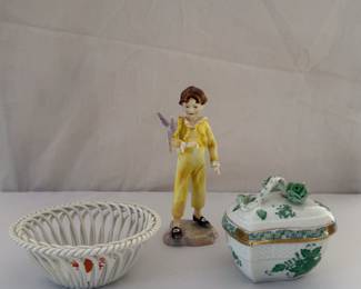 A Herend Porcelain Chinese Bouquet pattern open weave basket, a Royal Worcester "The Parakeet" figurine, and a Herend Porcelain Chinese Bouquet pattern heart-shaped lidded trinket box.