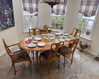 Large oval pine dining table and six chairs, multiple pieces of Limoges and other continental porcelains