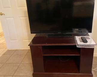 Sharp 42 TV And Cabinet 