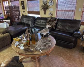 Rustic round oak coffee table, electric reclining leather sectional, driftwood, bird devot