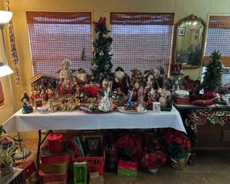 Christmas decor including nativity, trees, Santa’s, ornaments, etc