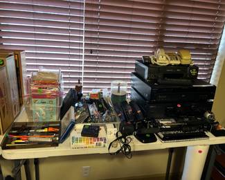Office supplies, cameras, tripods, VCR’s