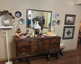 Beautiful ornate sideboard (matches buffet & curio cabinet), antique bird cage, oil lamps—one with milk glass globe 