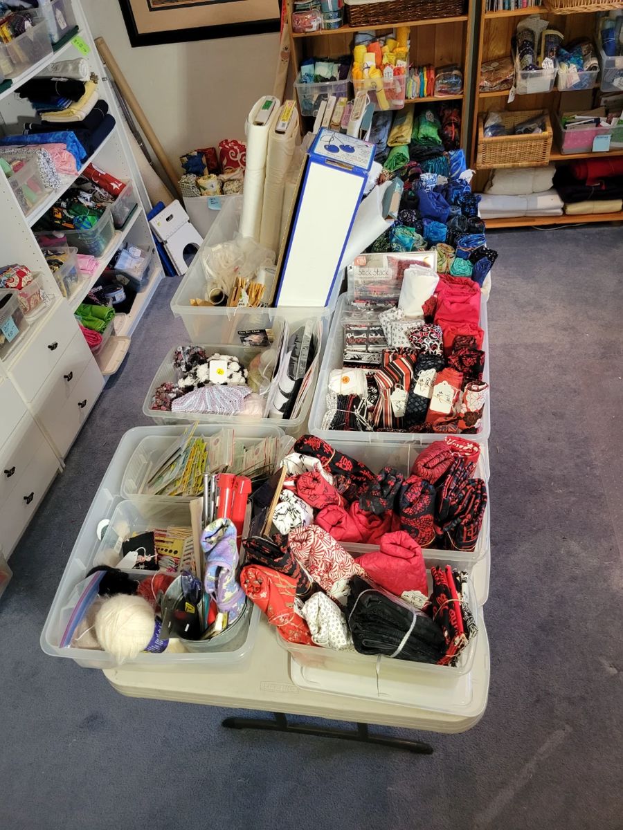 Knitting supplies, bolts of stabilizers and muslin, fabric, fabric, fabric.