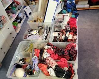 Knitting supplies, bolts of stabilizers and muslin, fabric, fabric, fabric.
