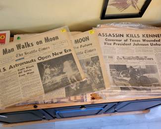 Antique moments in history newspapers.