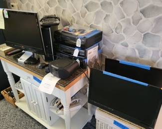 Windows 10 desktop PC with monitor, keyboard, mouse. Gently used VCRs. Flat screen monitors, tabletop CD player.