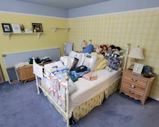 Double iron and brass bed (like new). Assortment of linens, nightstand, lamps, Lots of bunny items.