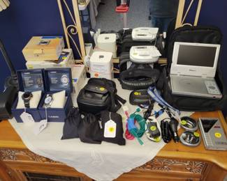 Cameras, portable DVD player, Apple accessories, watches, etc.