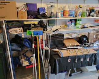 Bags, crutches, window and floor cleaning supplies, Rainbird sprinkler system control system.
