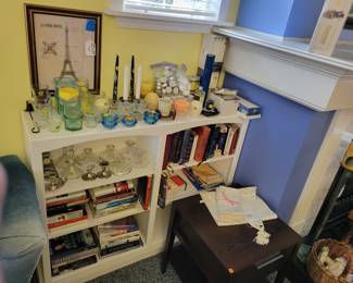Paris wall decor, candles and candle holders, books. Target night stand.