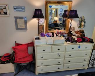 Large 10 drawer dresser with glass top (excellent condtion). Vintage directors chair/ Vintage recovered and painted toy box. Lamps and gold mirror.