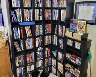 DVD's, Cassetts, CD's. Bookcase not for sale.