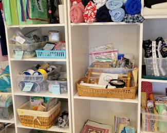 Flannel, needles, sewing machine needles, buttons, ribbons and trims, quilt kits.