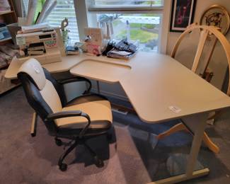 Sewing table and office chair. Quilting hoop, Pfaff sewing machine, Singer Baby Lock serger.