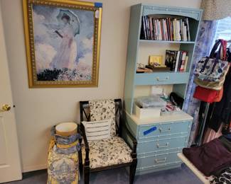 Custom upholstered black vintage chair, vintage 2 piece hutch with bamboo details, large art work. Books, costume jewlery.