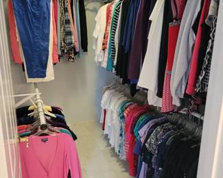 Walk in closet with more women's clothes. Well known designer labels, Pendleton, Chicos, Ralph Lauren, Jones of New York, etc,