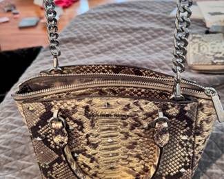 Unique and beautiful.  Michael Kors textured, studded, python handbag.  It's like new.  I have a matching wallet/clutch for sale as well.  