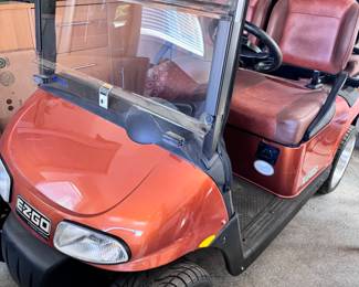 Four-person custom with western leather seats, many upgrades, including bluetooth., leather, lights, and sides. Electric EZ Cart -Golf Cart. It is in like-new condition but does need batteries, which is already reflected in the price.  Needs leather repair. 