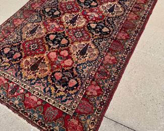 Geniune Hand-woven Oriental Rug, with Fur Tree Motif.  Measuring 4'8" x 7'2"