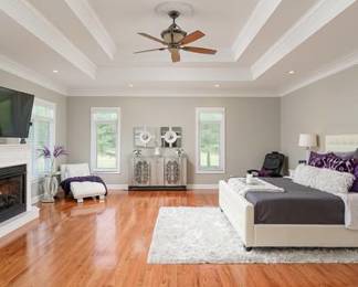 The cabinet, bedding, and accessories are the only items left in this room.