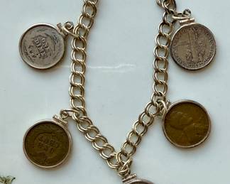 Sterling and vintage US coin charm bracelet