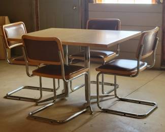 $200 STUNNING MCM/VINTAGE DINING TABLE WITH LEAF AND FOUR CHAIRS IN GREAT CONDITION. CHROME IS IN AMAZING CONDITION AS WELL.