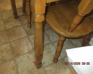 nice carved legs on both chairs and table