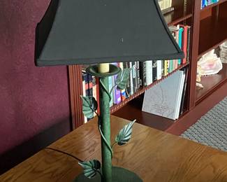 Metal table lamp with green leaf accents