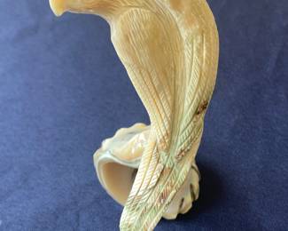 Carved shell parrot, signed Fabian Homer