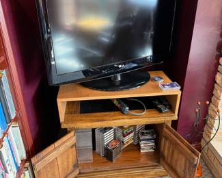 37" LG TV and media storage cabinet