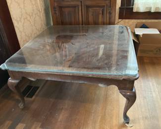 This is a lovely glass topped coffee table.