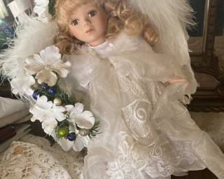 The owner collected dolls. They are downstairs and upstairs.