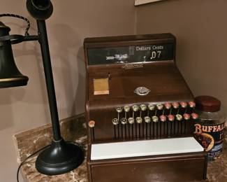 Antique cash register and makes for a great conversation piece. Now we do Square!🤣