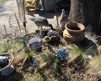 We have a patio and yard full of amazing decor and treasures! Planting pots, chairs, statues, decor accents, tables, storage, handmade items, & so much more!