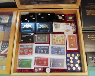 Lots of uncirculated collector coin sets.