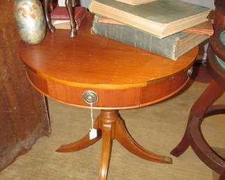 Vintage round end table/accent table w/ brass accents on feet. (Has a boo-boo on one foot but it's in the drawer and can be attached)
