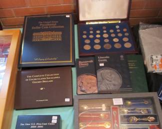 Lots of uncirculated collector coin sets.