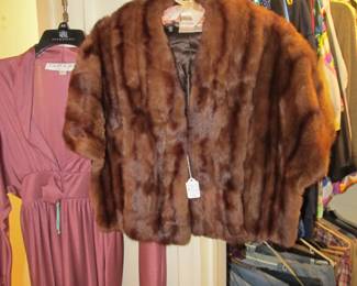 There is a nice variety of women’s clothing from casual to dressy.
	Sizes range from: L-SM in tops / Pants 29 Regular, but vary / Shoes 8.5
VTG mink stole and wrap
VTG Navy uniforms, VTG kid's clothes
Camo hunting coveralls
