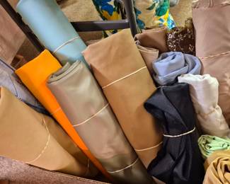 Rolls of vinyl fabric, great for covering barstools