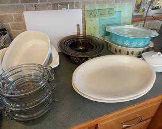 Vintage covered pyrex cookware, mixing bowls and essential bakeware and glass storage/cookware