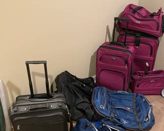 Luggage, rolling briefcase, and duffel bags