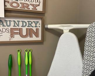 ironing board, signs, and swiffers