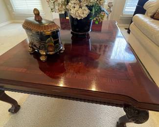 Coffee table with inlay, hydrangea faux floral planter, and decor 