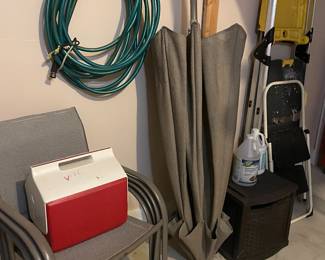 patio chairs, umbrella, and table (photo to come); hose reel, cooler, ladders and more