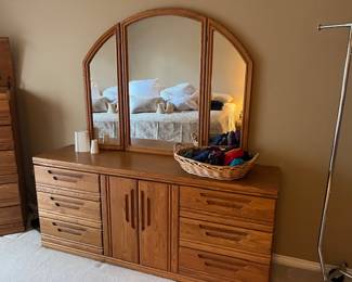 Long dresser with mirror - the center cabinet has a pull-out jewelry drawer 